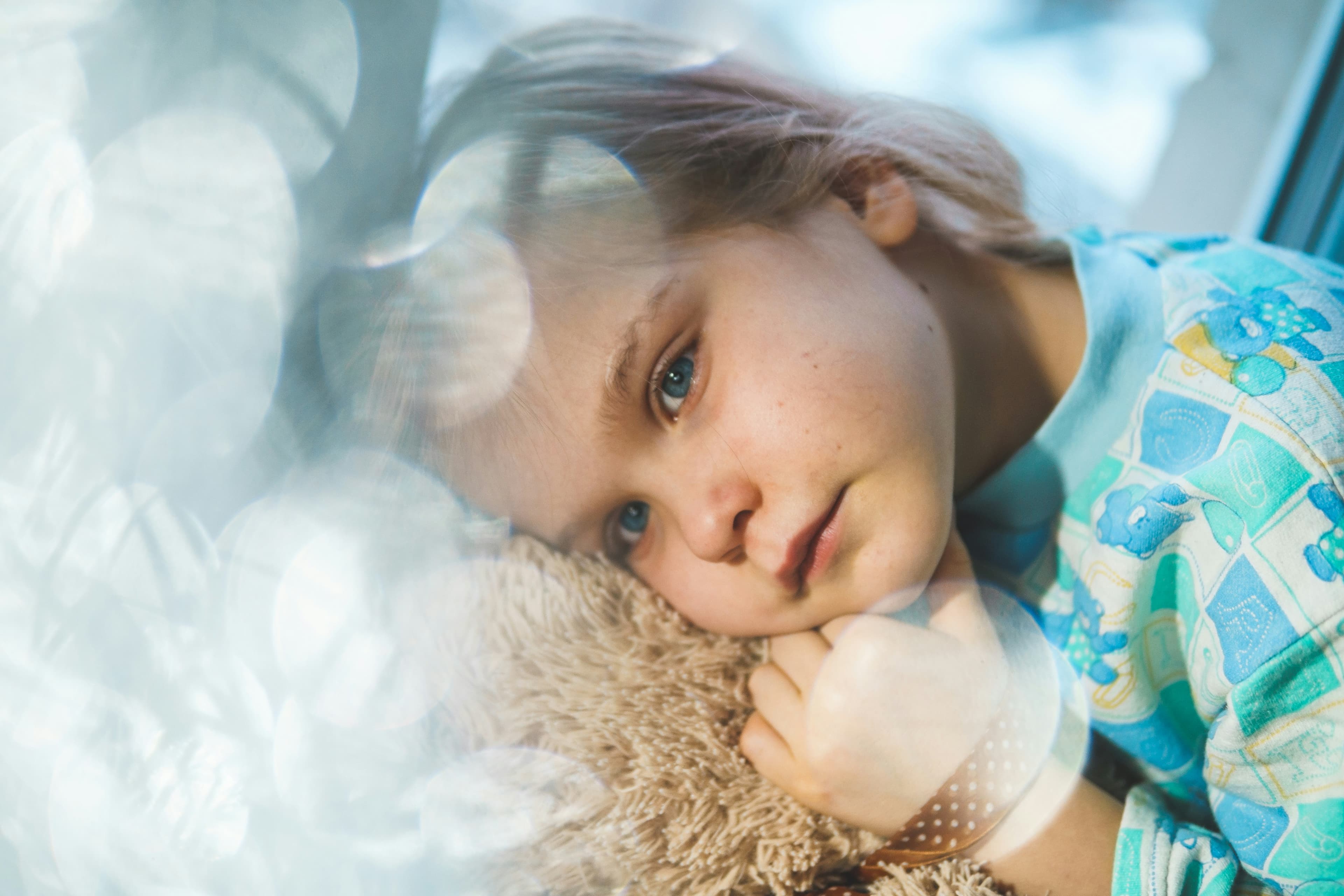 Child resting, representing autoimmune disease care in children