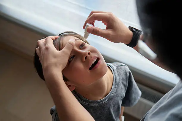Child eye examination visual for uveitis and eye inflammation symptoms
